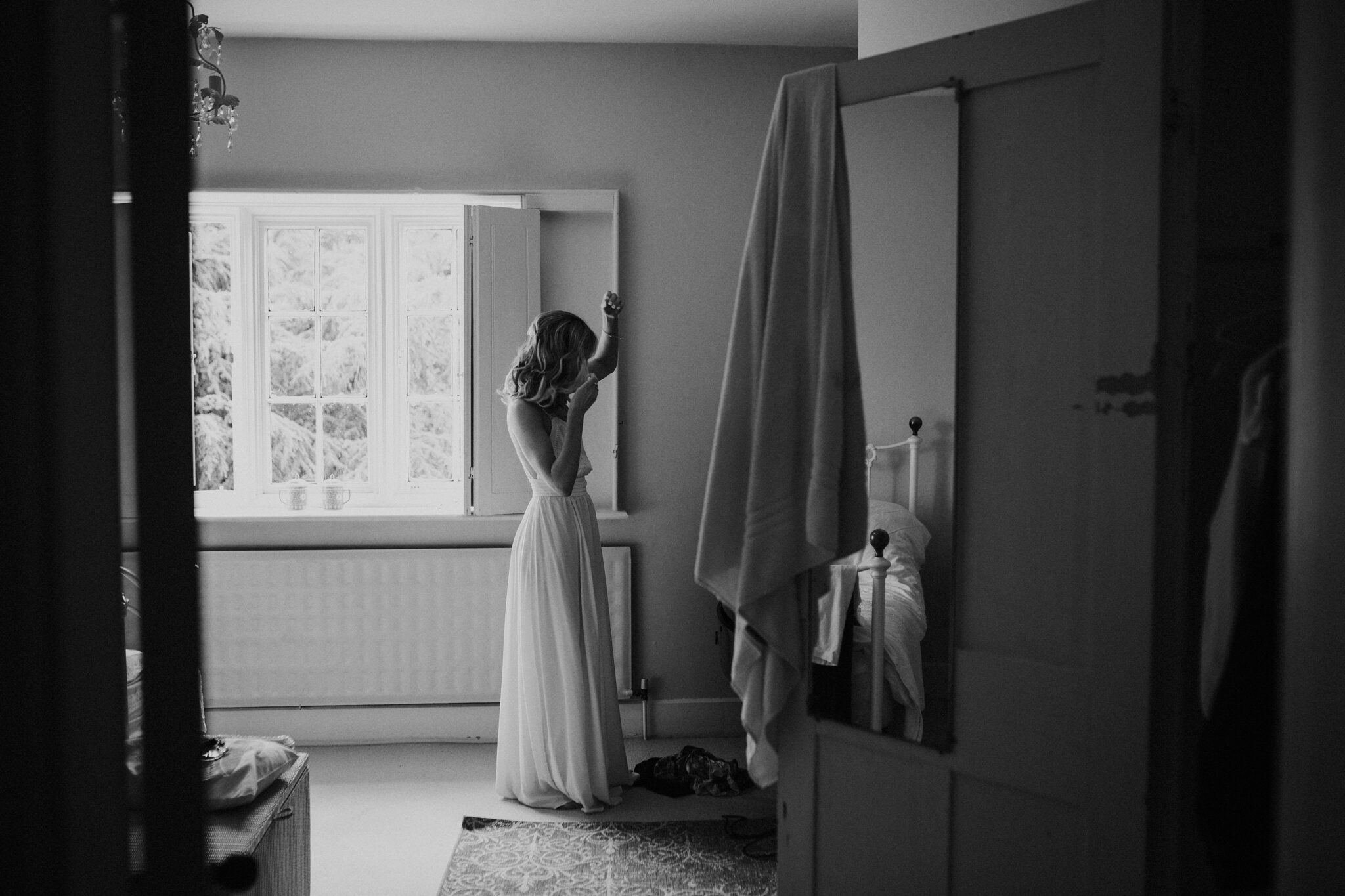 Bride getting ready in France on her wedding. Photography by Coralie Monnet